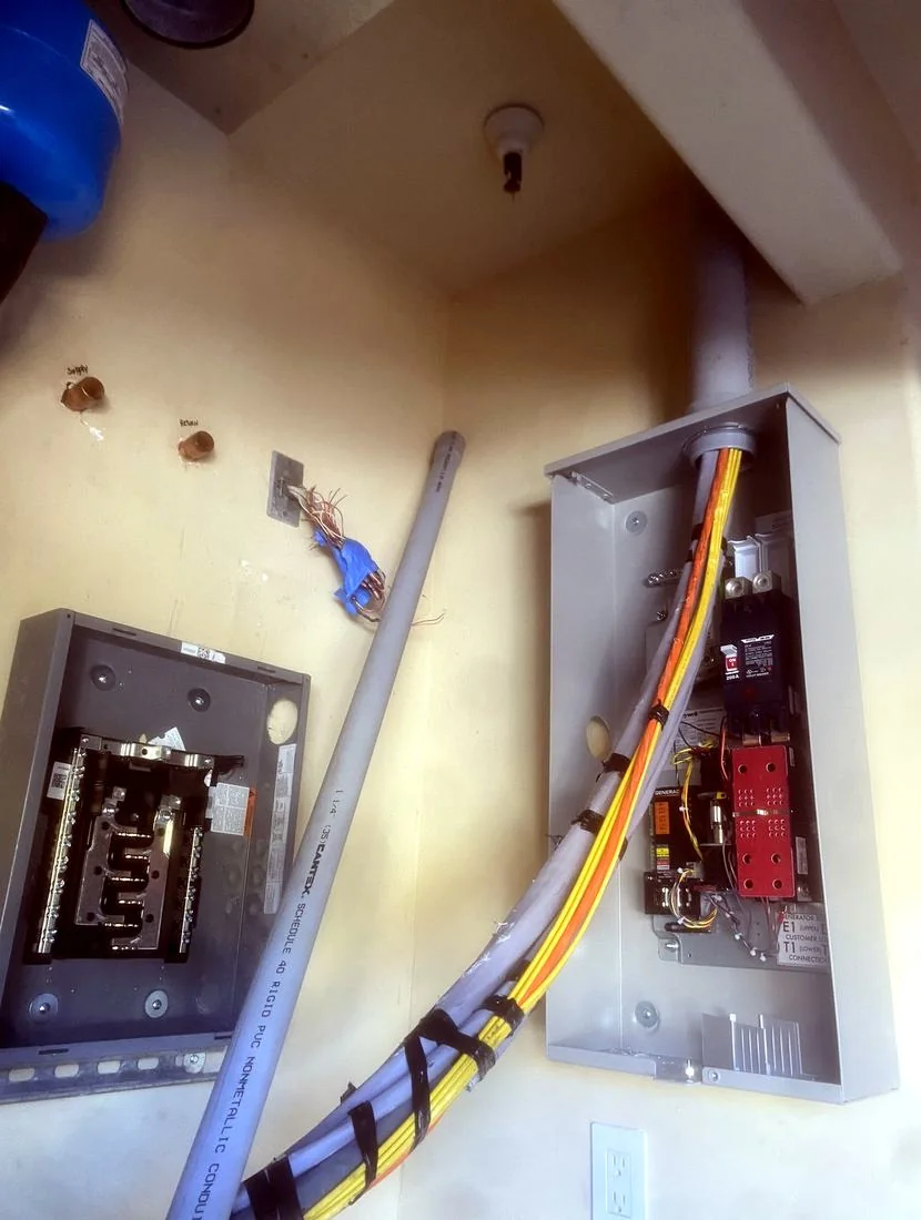 Electrical panel and transfer switch wiring completed by Spark Electrical Solutions