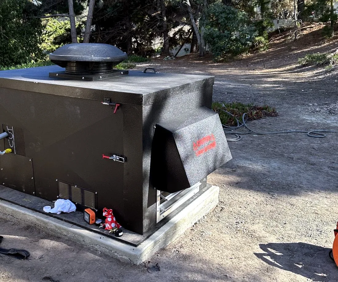 Whole-home standby generator installed on a concrete pad by Spark Electrical Solutions